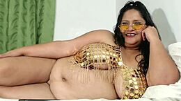Chubby goddess flaunts her belly