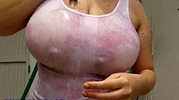Chanel Frost's big tits bounce in the rain water