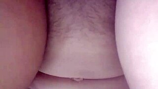 Asian wife enjoys passionate lovemaking on the bed