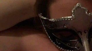 Wife with blonde hair receives facial from husband