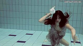 Loris Licicia's tantalizing underwater swim in the nude