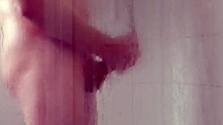 Mature woman surprises her submissive partner while he masturbates in the bathroom