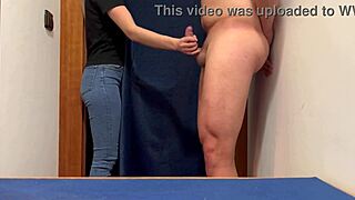 Public sex in a clothing store fitting room caught on camera