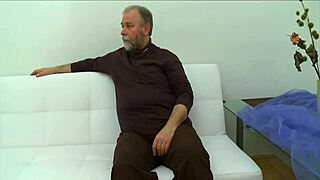 Beautiful young woman having sex with an older man