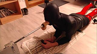 Machine fucks throat and anal in a casual scene