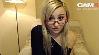 Blonde girl chats in glasses during casting interview.