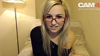 Blonde girl chats in glasses during casting interview.