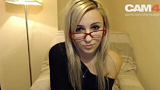 Blonde girl chats in glasses during casting interview.