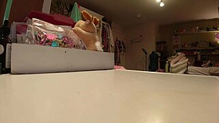 Under the spell of Love Potion No 5, she fingers herself wild.