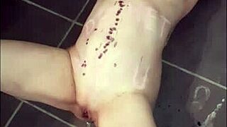 Watch the slave endure candle wax and cumshot