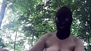 Female slave explores outdoor BDSM in forest