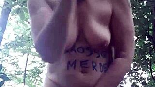 Female slave explores outdoor BDSM in forest