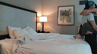 Tattooed teens in romantic makeout