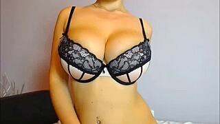 Blonde kattelovely1 shows big tits on webcam in bold action