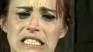 Bondage session unfolds with intense domination