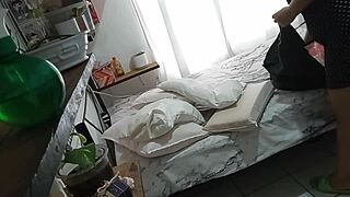 curvy woman tidies up her room secretly