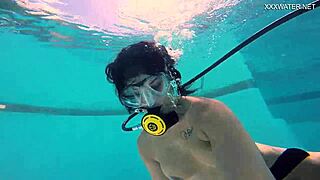 Brita Piskova fingers herself underwater in tight swimming pool