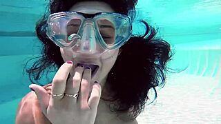 Brita Piskova fingers herself underwater in tight swimming pool