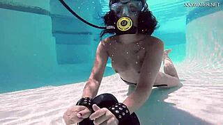 Brita Piskova fingers herself underwater in tight swimming pool