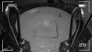 surveillance camera captures unfaithful wife in hotel jacuzzi