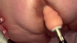 Ass stretching 101 with brunette amateur using homemade machine.