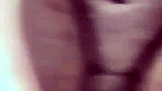 rear view of intense choking and gagging scene