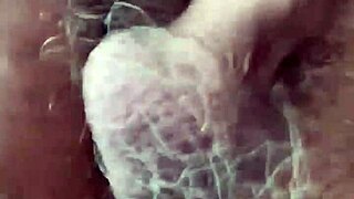 rear view of intense choking and gagging scene