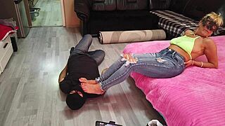 blonde mature woman receives intense foot worship, licking her toes and soles passionately