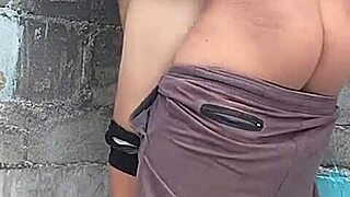 Brunette neighbor against the wall