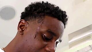 After the gym workout, that ebony guy gave an interracial blowjob to the monster cock.