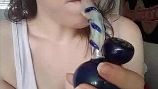 Nude brunette femdom indulges in solo masturbation while sexting dominantly.