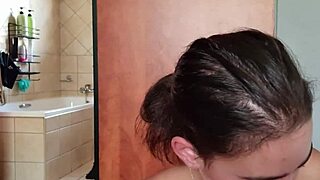 gathering saliva while deepthroating double-ended dildo for fetish fun