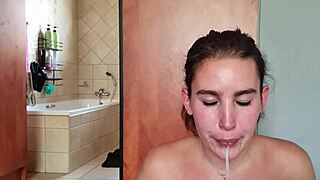 gathering saliva while deepthroating double-ended dildo for fetish fun
