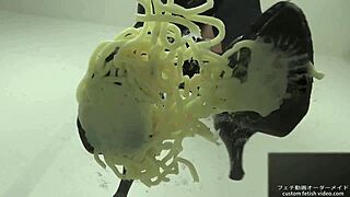 Asian girl stomps noodles in shoes for foodcrush fetish