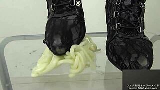 Asian girl stomps noodles in shoes for foodcrush fetish