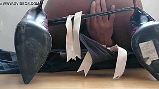 A sexy Mexican woman wearing pink high heels begins her masturbation session, touching herself slowly at first.