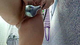 butt plug in milf's ass while bathing in shower?