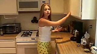 Horny teen April toys her tight pussy, teasing with ripped clothes