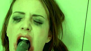 Busty woman feels intense pleasure while tied up and gagging on toy