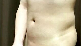 Bold Asian Girl Shows Shaved Pussy and Cock in Intense Action