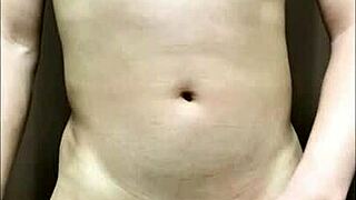 Bold Asian Girl Shows Shaved Pussy and Cock in Intense Action