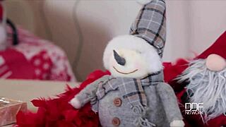 Horny holiday blonde fingers her shaved pussy in stockings