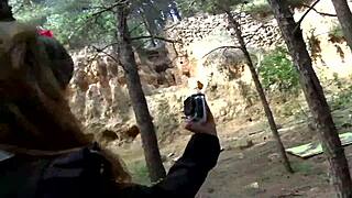 Couple explores forest with teen 18+ in public outdoor setting.