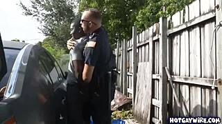 two police officers in uniform taking advantage of black guy at work