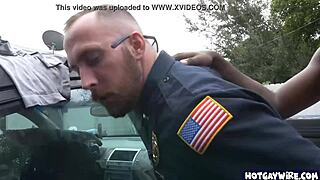two police officers in uniform taking advantage of black guy at work