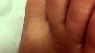 I remove my nylon and shower, letting water caress my toes in this foot fetish.