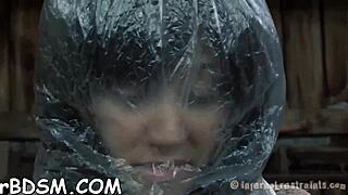 this brunette minx uses a sex-toy to cum hard in bdsm session