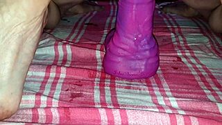 training session with huge dildo in chastity device