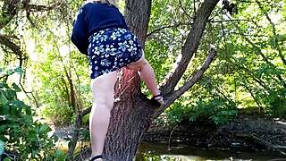 horny milf fingers herself outdoors with legs high in kinky fetish