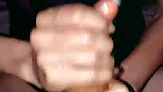 skinny couple engages in sexy handjob session